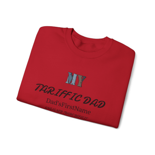 A folded red t-shirt with a text design on the front