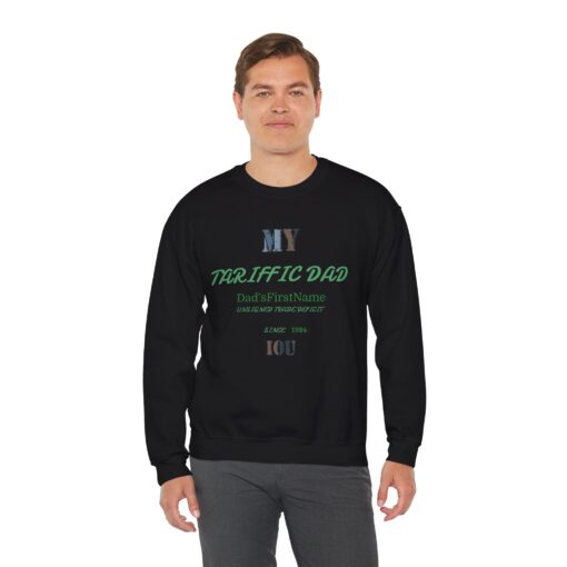 A smiling man wearing a black sweatshirt with a text design on the front